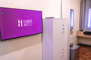 TV a/nebo společenská místnost v ubytování HOSTEL CUARTO