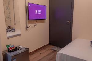 TV a/nebo společenská místnost v ubytování HOSTEL CUARTO