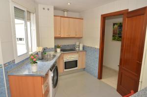 Kuchyňa alebo kuchynka v ubytovaní Habitación Malaga centro