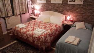 Postel nebo postele na pokoji v ubytování B&B Family Home