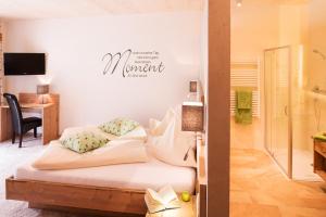 Voodi või voodid majutusasutuse Hotel Hubertushof toas