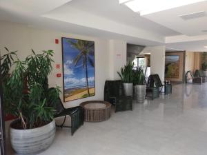 The lobby or reception area at Guarajuba Paraíso dos Coqueiros