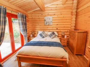Katil atau katil-katil dalam bilik di Maple Lodge