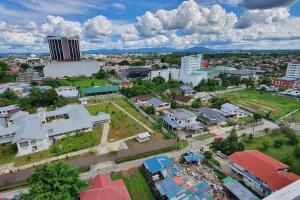 an aerial view of a city with buildings at Kozi Square New SGH Cozy Home LV5B in Kuching