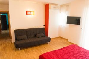 TV a/nebo společenská místnost v ubytování MozÁrt Bed & Breakfast - Affittacamere