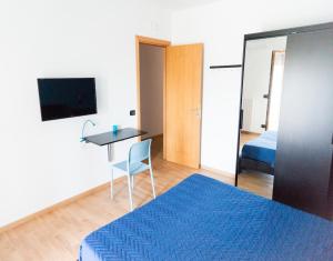 TV a/nebo společenská místnost v ubytování MozÁrt Bed & Breakfast - Affittacamere