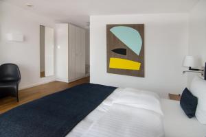 Postel nebo postele na pokoji v ubytování Downtown Vi Vadi Hotel