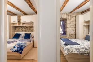 Posteľ alebo postele v izbe v ubytovaní Rural holiday home Stankolina Opatija