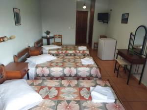Postel nebo postele na pokoji v ubytování Miaritis rooms