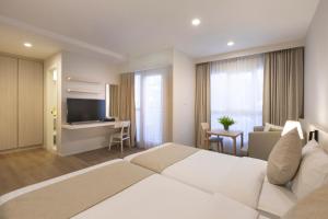 TV a/nebo společenská místnost v ubytování Kantary Hotel Banchang