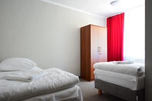 Postel nebo postele na pokoji v ubytování Hotel Felix