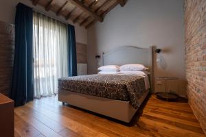 Letto o letti in una camera di Sei Sequoie Nature & Charme