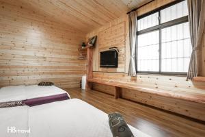 TV a/nebo společenská místnost v ubytování Alishan Sunrise B&B