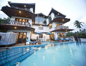 Bazén v ubytování Paradise Island Estate nebo v jeho okolí