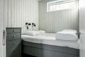 A bed or beds in a room at Villabranten! Ski In - Ski Out, Bike In - Bike Out