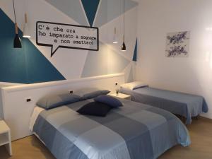 Postel nebo postele na pokoji v ubytování B&B Luna per te