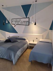 Postel nebo postele na pokoji v ubytování B&B Luna per te