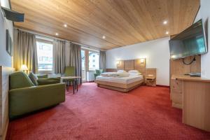 Televízia a/alebo spoločenská miestnosť v ubytovaní Schönblick - Gurgl B&B
