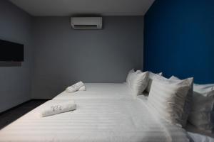 Postel nebo postele na pokoji v ubytování Chariton Hotel Bagan