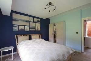Posteľ alebo postele v izbe v ubytovaní Sun&Sport Apartament PANORAMA dwupoziomowy i przestronny