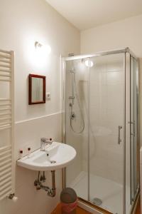 a bathroom with a sink and a shower at Graceful apartment in the heart of Florence in Florence