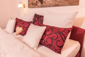 Letto o letti in una camera di Hubertushof