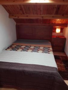 Un pat sau paturi într-o cameră la Moradia Machado