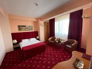 Postel nebo postele na pokoji v ubytování Hotel Class + 24 fotografií