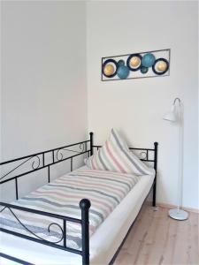 Ein Bett oder Betten in einem Zimmer der Unterkunft Citywohnung Südliche Innenstadt II