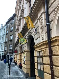 a building with a sign for a blind bears store at New Generation Hostel Prague Center in Prague