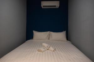 Postel nebo postele na pokoji v ubytování Chariton Hotel Bagan
