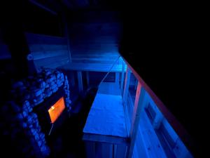an overhead view of a dark room with a flashlight at Pension Labrador in Karuizawa