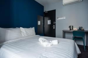 Postel nebo postele na pokoji v ubytování Chariton Hotel Bagan