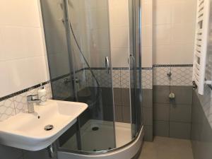 Kúpeľňa v ubytovaní Apartament Rodzinny S10