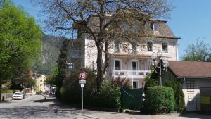 a house on the side of a street with a no parking sign at Villa Bariole in Bad Reichenhall