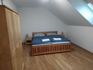 Postel nebo postele na pokoji v ubytování Apartmán Poštolka