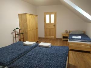 Postel nebo postele na pokoji v ubytování Apartmán Poštolka