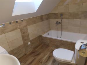 Koupelna v ubytování Apartmán Poštolka + 9 fotografií
