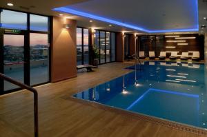 a large swimming pool in a hotel room at Hotel Adria in Dubrovnik