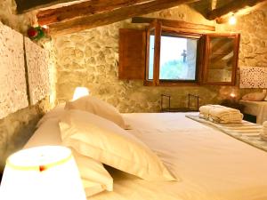 Postel nebo postele na pokoji v ubytování La Casuna de la Una