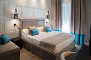 Katil atau katil-katil dalam bilik di Hotel Lungomare