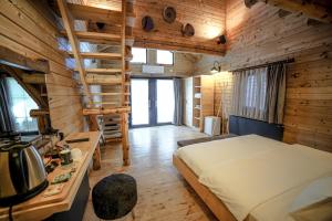 Postel nebo postele na pokoji v ubytování Pino Mar Luxury Bungalows