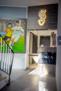 TV a/nebo společenská místnost v ubytování Löwen Hotel