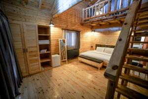 Postel nebo postele na pokoji v ubytování Pino Mar Luxury Bungalows