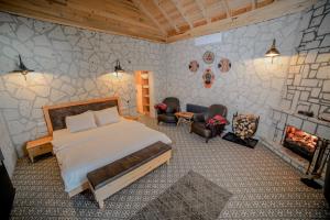 Postel nebo postele na pokoji v ubytování Pino Mar Luxury Bungalows
