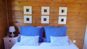 Cama ou camas em um quarto em Casa Alfazema, Quinta Carmo - Alcobaça - Nazaré