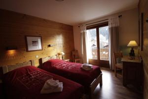 Postel nebo postele na pokoji v ubytování Esprit Montagne