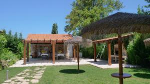 Um jardim em Casa Alfazema, Quinta Carmo - Alcobaça - Nazaré