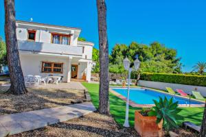 A piscina localizada em Colibri - modern, well-equipped villa with private pool in Moraira ou nos arredores