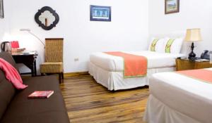 Postel nebo postele na pokoji v ubytování Altamont West Hotel